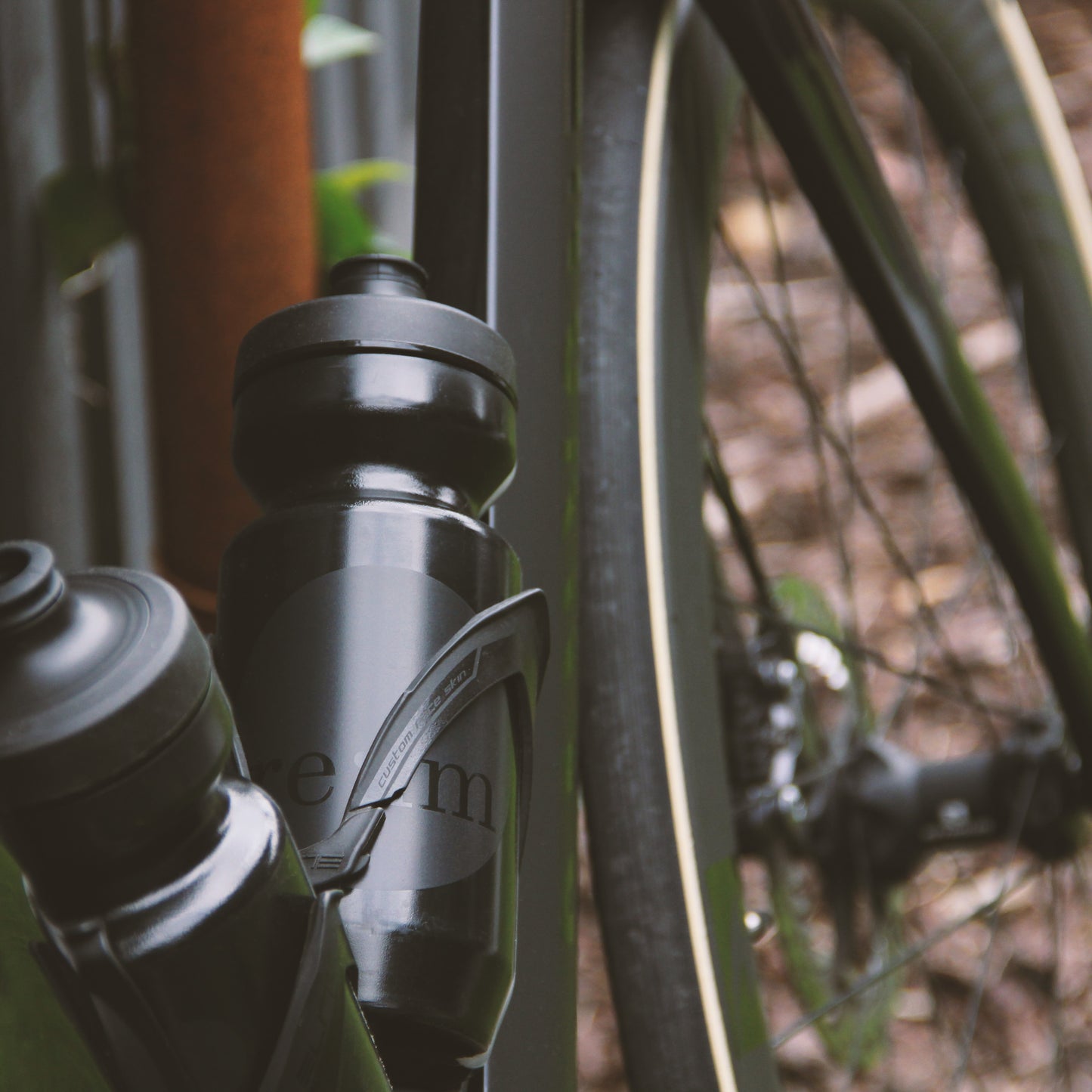 Two black Relm Cycling bidons on a bike